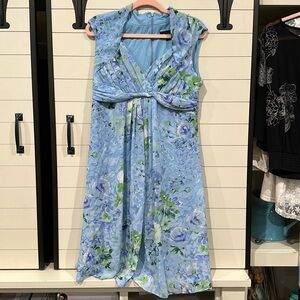 Blue floral dress. Zips in back.